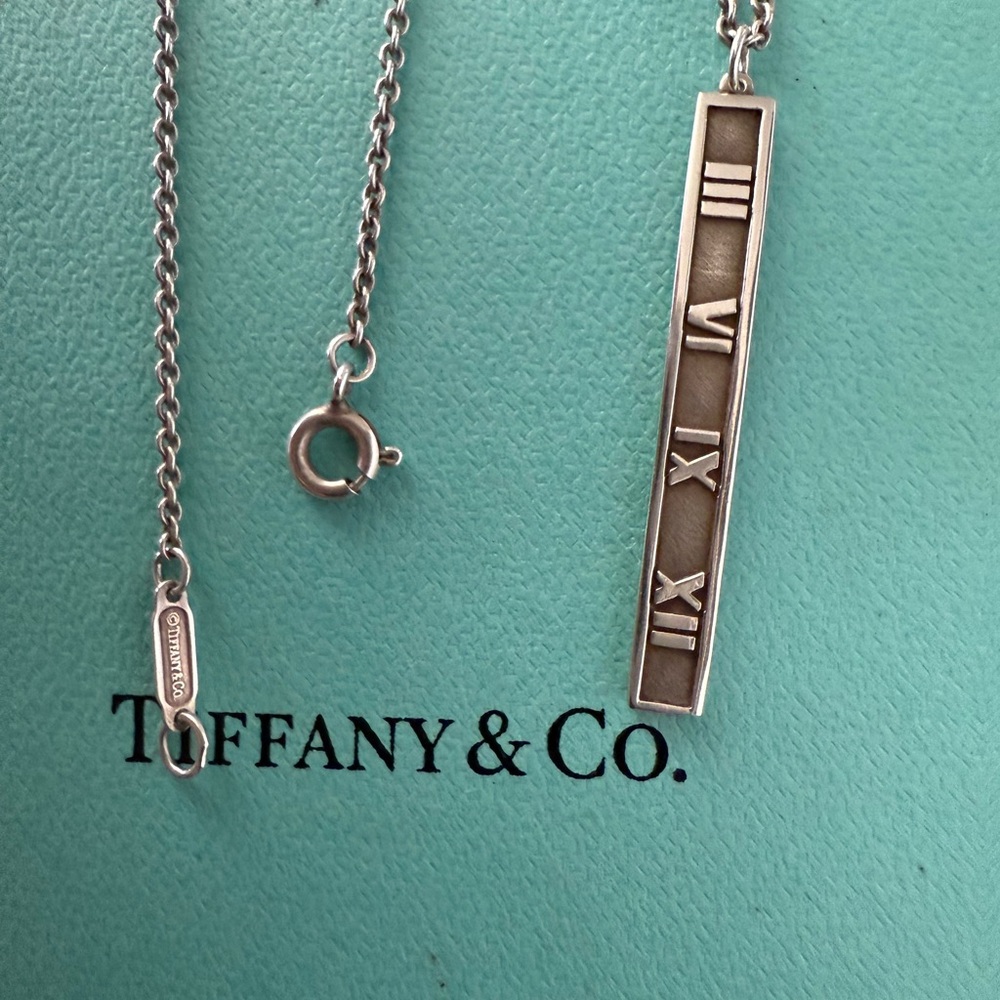 Tiffany & Co. Silver Atlas Roman Numeral Pendant Necklace